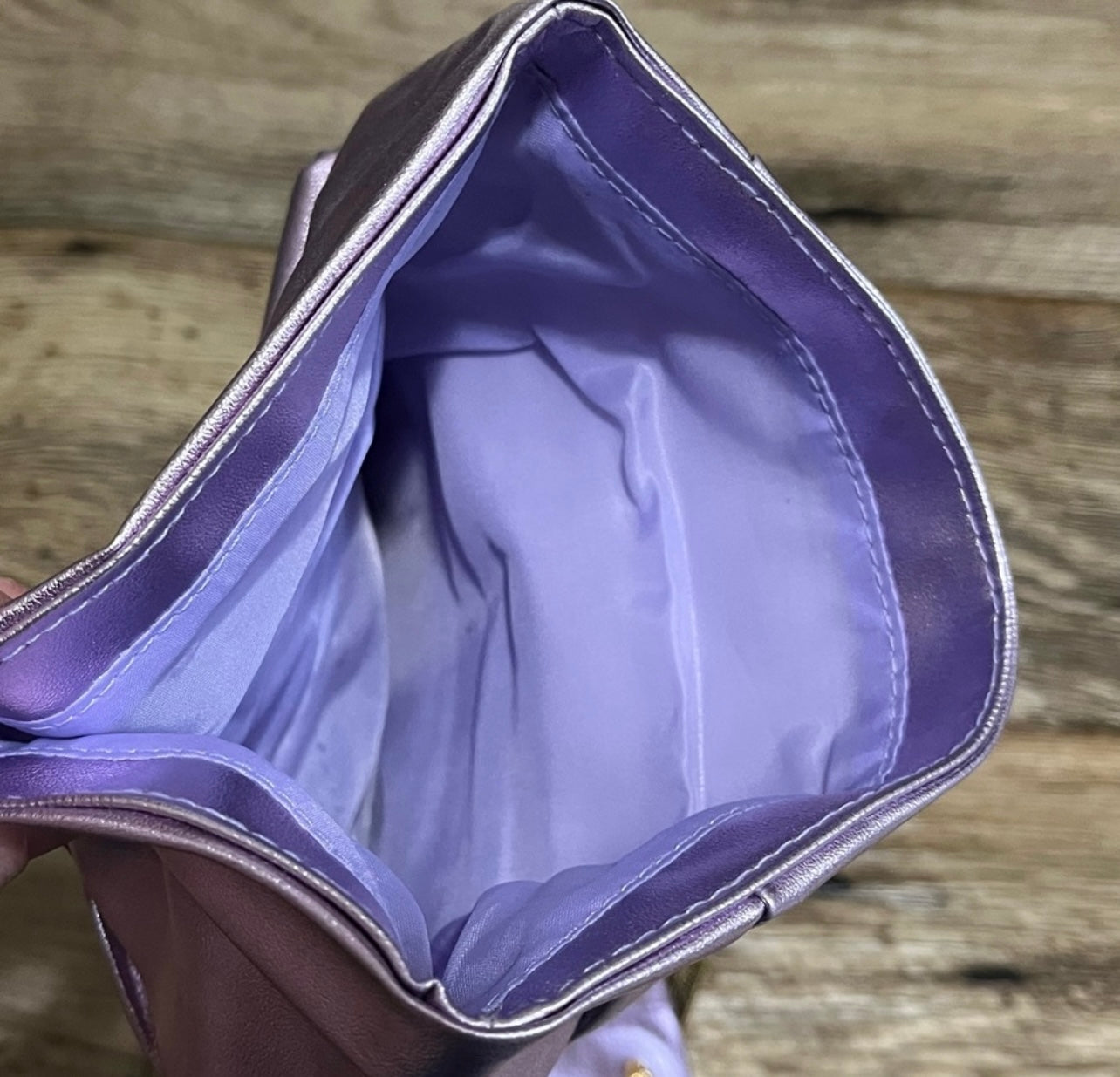 Versace Parfums purple satin bow clutch bag