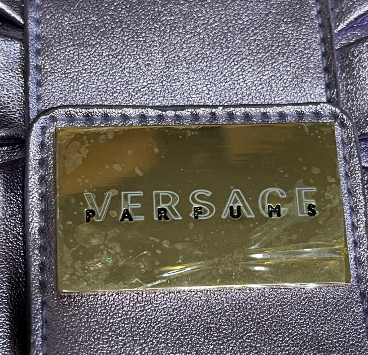 Versace Parfums purple satin bow clutch bag