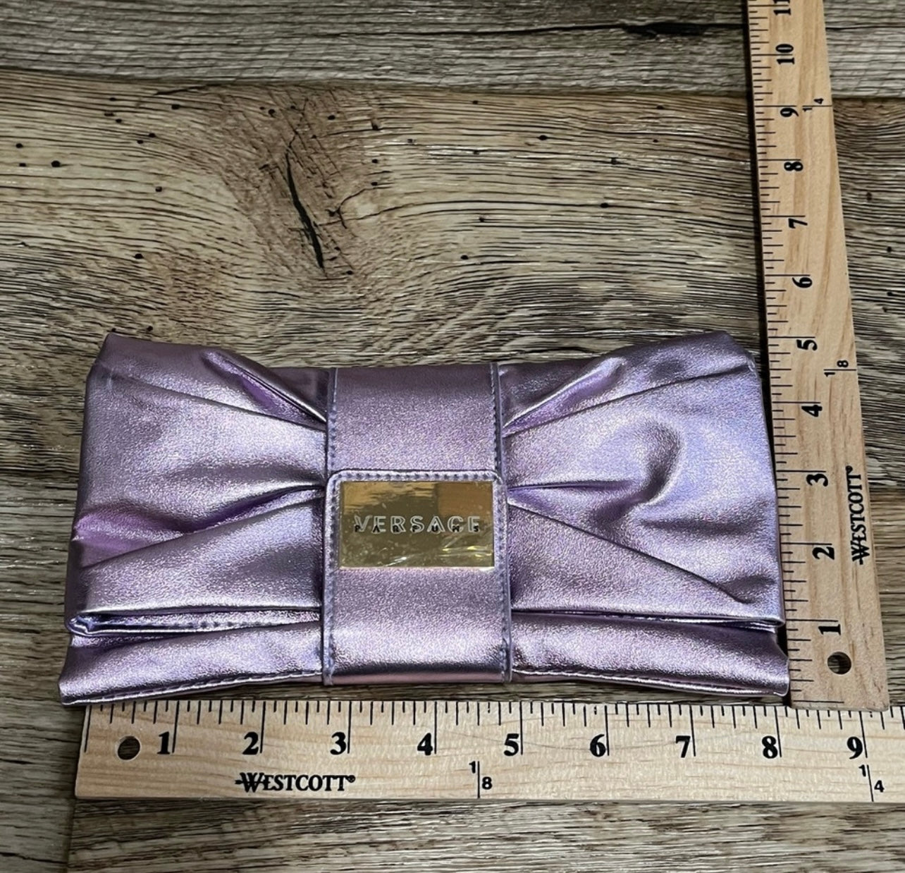 Versace Parfums purple satin bow clutch bag