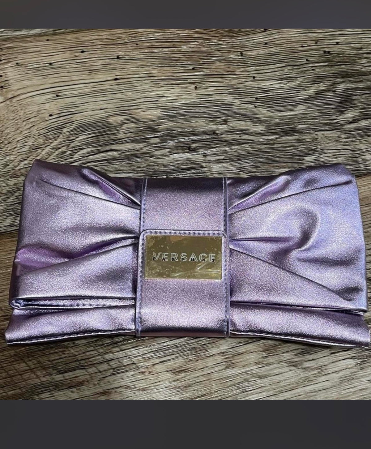 Versace Parfums purple satin bow clutch bag
